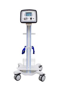 A medical device on a wheeled cart. The device features a digital display at the top, which includes buttons and dials for operation. It has a tall, slender vertical pole and is mounted on a base with four casters for mobility. There is a basket at the bottom for storage, and two blue handles are attached to the pole for easy maneuvering. The overall structure is predominantly white with some blue accents.